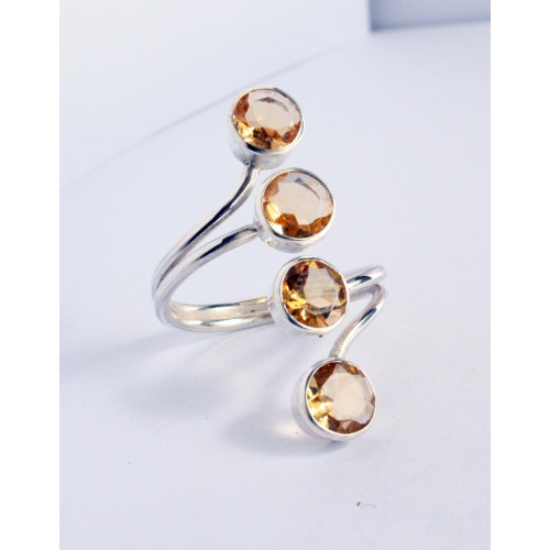 Four stone adjustable ring